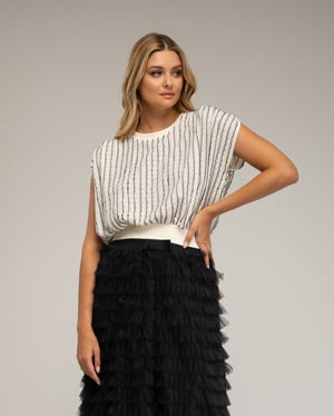 Mouwloze gebreide mesh top