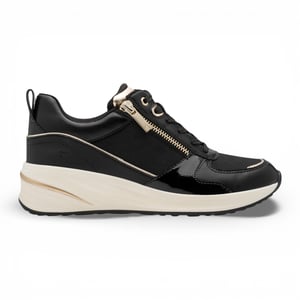 Tamaris dames hardloopschoenen met platformzool, zwart en goudkleurig, met ritssluiting en vetersluiting.