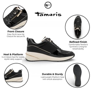 Tamaris dames hardloopschoenen met platformzool, zwart en goudkleurig, met ritssluiting en vetersluiting.