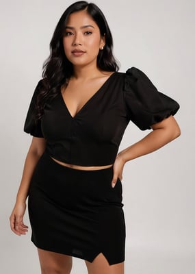 Zwarte corset-top met pofmouwen en naaddetails