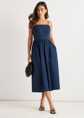Marineblauwe jumpsuit met wijde pijpen en bandjes