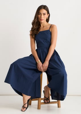 Marineblauwe jumpsuit met wijde pijpen en bandjes
