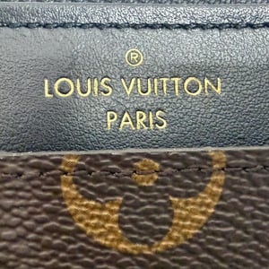 Louis Vuitton Monogram Canvas Slim Handtas in Bruin Leer