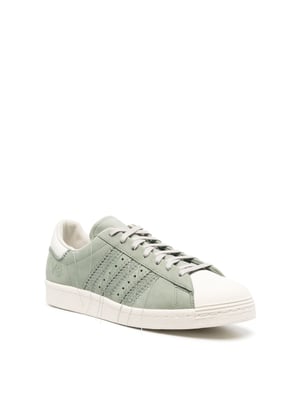 Superstar sneakers met losse draden