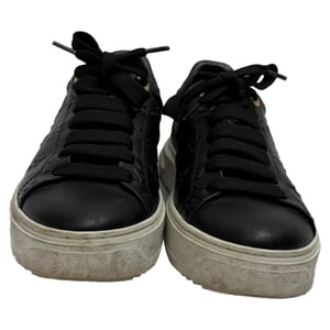 Louis Vuitton Monogram Time Out sneakers in zwart leer
