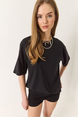 Ontspannen Pasvorm Crew Neck Katoenen T-Shirt met Split