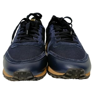 Valentino Garavani Rockrunner sneakers in marineblauw met gemengde technieken.