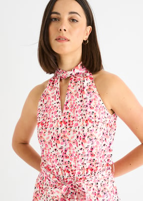 Roze jumpsuit met bloemenprint en halternek