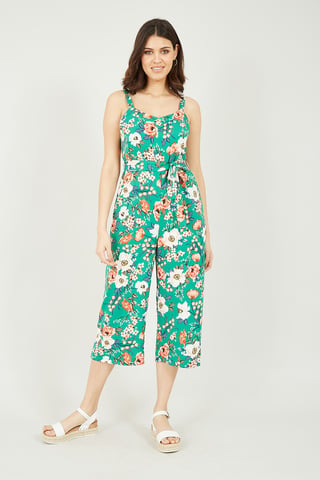 Mela groene jumpsuit met rokbroek en bloemenprint