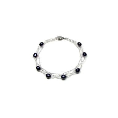 Gedraaide zilveren (925) armband met zwarte zoetwaterparels