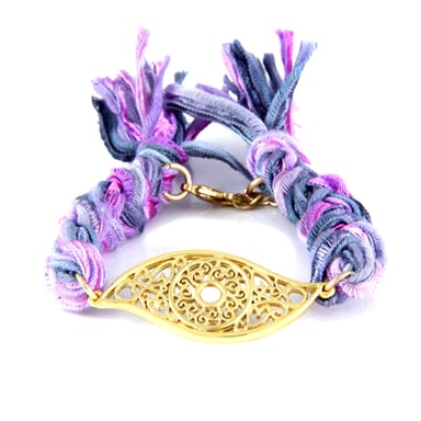 Ettika - Armband met paarse linten en geelgouden oog