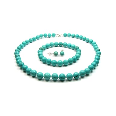Set voor dames met een ketting, armband en oorbellen met turkoois-parels
