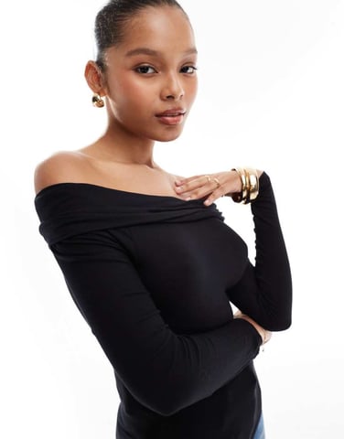 Vila avfallande axel vikbar jersey topp i svart