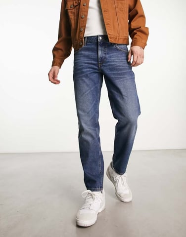 ASOS DESIGN tapered fit jeans i mörk vintage tvätt - MBLUE