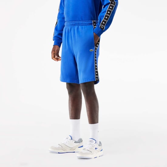 Men's Lacoste Logo Stripe Fleece Jogger Shorts in Blue