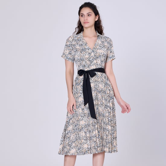 Pleats printed tea dress and added belt