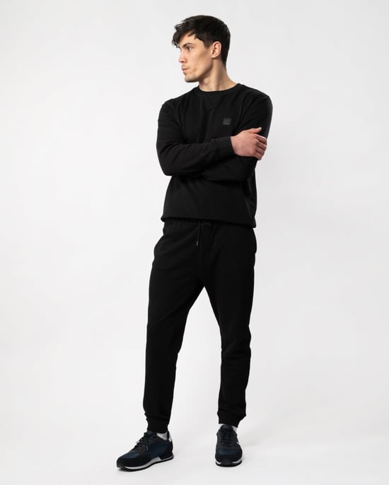 Men's Boss Logo Patch Tracksuit Bottoms in Black - Image 4