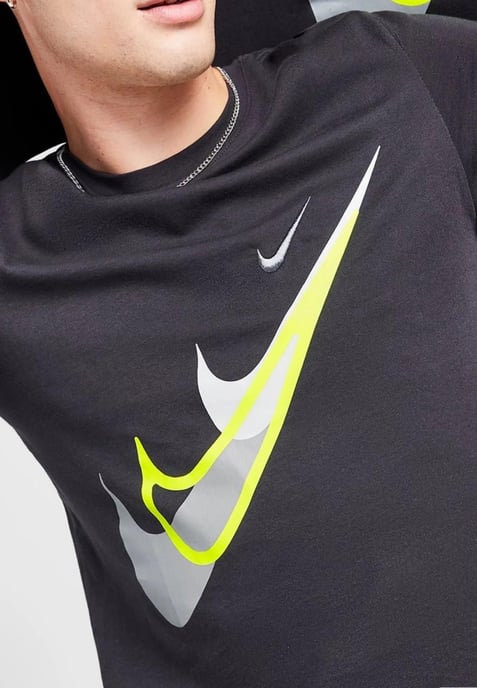 Nike Sportswear Standard Issue Moto T Shirt in Black