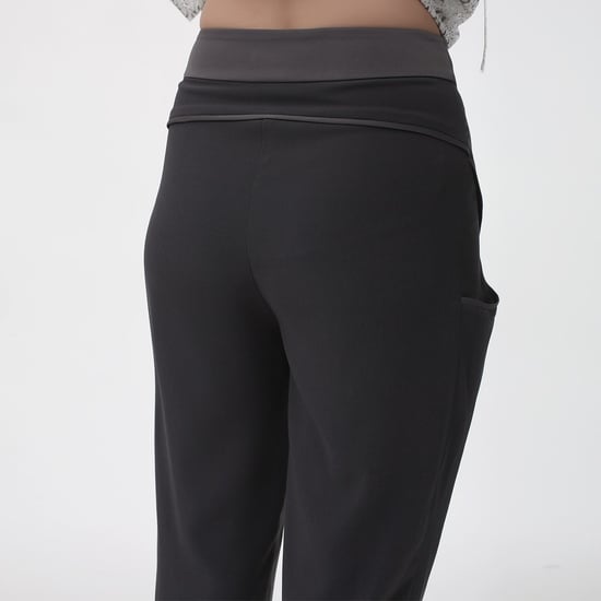 Bi-materiaal taps toelopende broek - Image 5