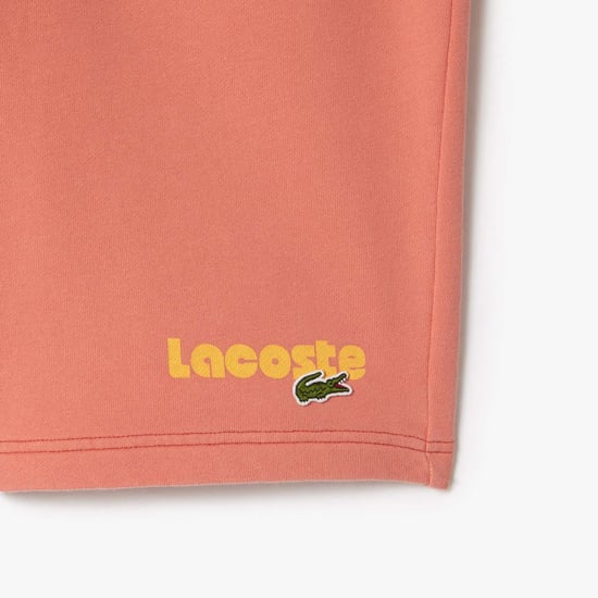 Men's Lacoste Washed Effect Printed Fleece Shorts in Red