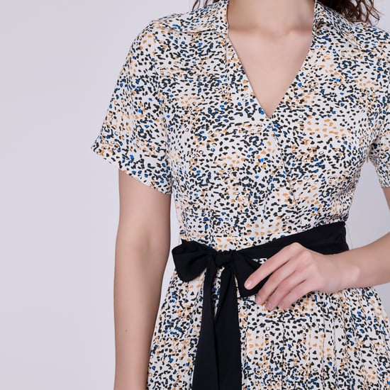 Pleats printed tea dress and added belt