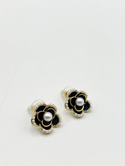 Black Flower Pearl Earrings in Gold - Image 1