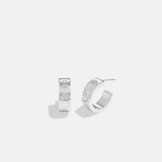Kissing C Small Huggie Earrings - Image 1