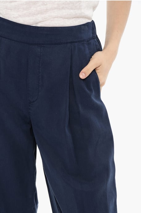 Enkelvoudige plooibroek met uitlopende pijpen in blauw - Image 3