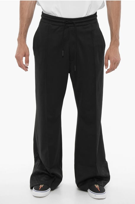 Wijde trainingsbroek met trekkoord in de taille in zwart - Image 1