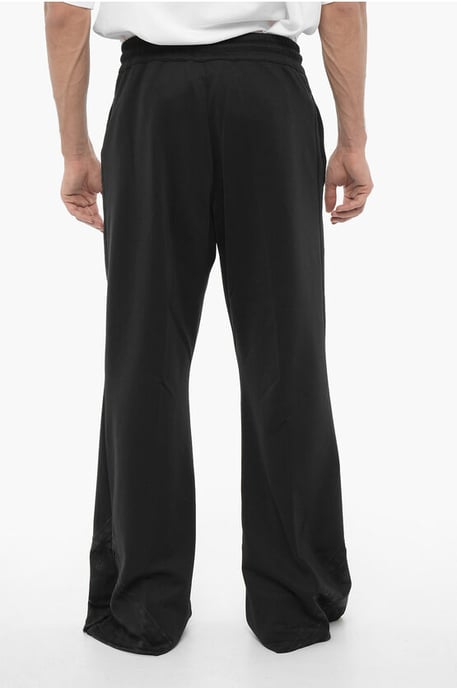 Wijde trainingsbroek met trekkoord in de taille in zwart - Image 2