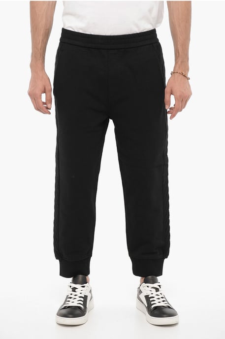 Effen joggingbroek met wollen zijbanden in zwart - Image 1
