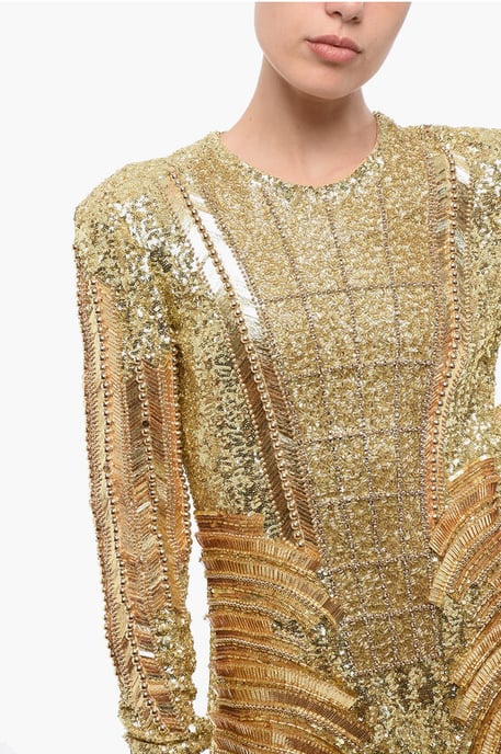 Mini-jurk met gouden effect, pailletten en kralen in goud - Image 3