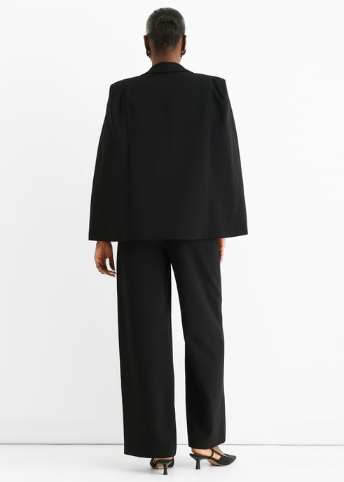 Zwarte cape-blazer met contrasterende dierenprint voering - Image 4
