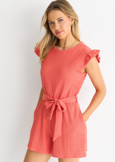Koraalkleurige playsuit met elastische tailleband, ruches en stretchtextuur - Image 2