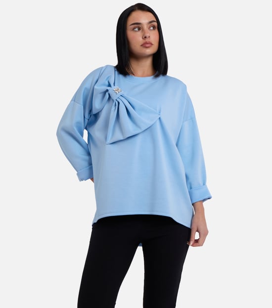 Blauwe oversized trui met contrasterende strik aan de zijkant - Image 2