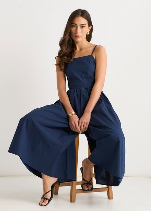Marineblauwe jumpsuit met wijde pijpen en bandjes - Image 2