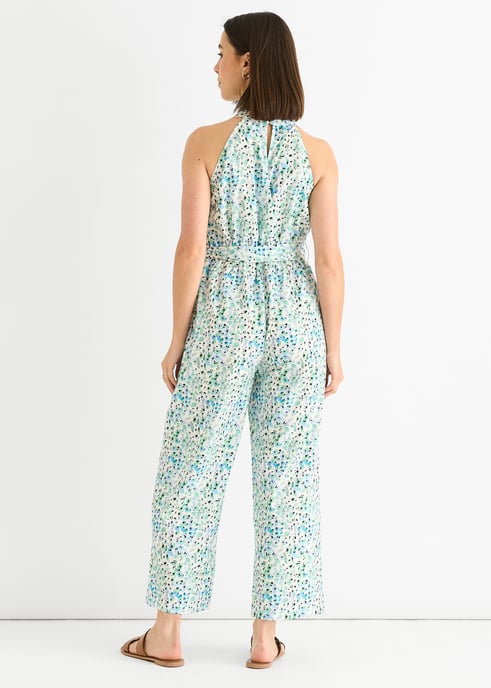 Blauwe jumpsuit met bloemenprint en halternek - Image 4