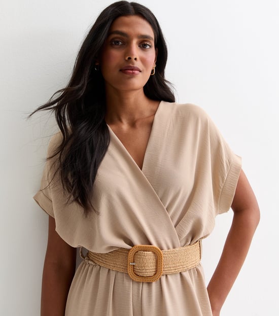 Beige jumpsuit met korte mouwen, elastische tailleband en ceintuur - Image 2