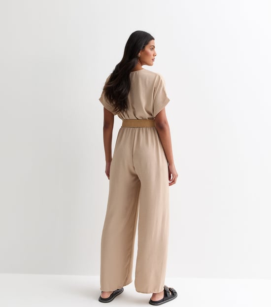 Beige jumpsuit met korte mouwen, elastische tailleband en ceintuur - Image 3