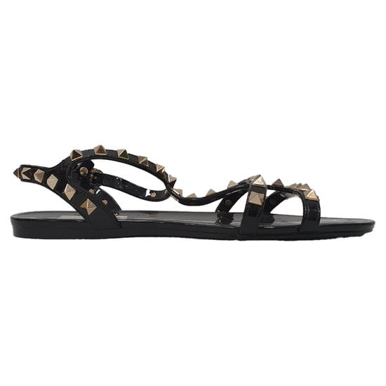 Valentino Garavani Rockstud T-Strap Platte Sandalen in Zwart Rubber - Image 1