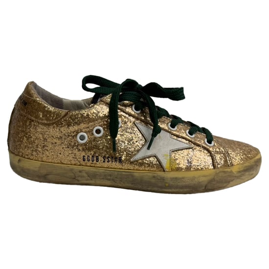 Golden Goose Super Star lage sneakers in metallic goudkleurige glitter. - Image 1