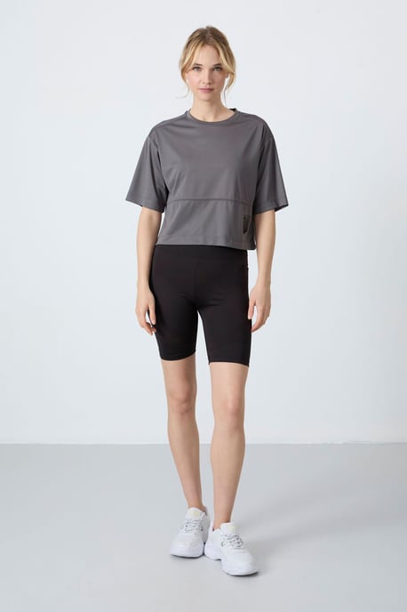Oversized polyester t-shirt met ronde hals en zak - Image 5