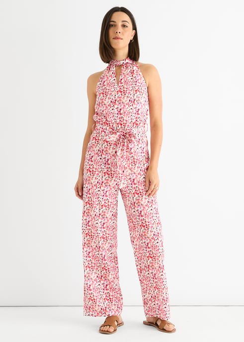 Roze jumpsuit met bloemenprint en halternek - Image 1